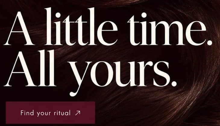 Close-up of the serif headline A little time. All yours. over dark hair, above a wine Find your ritual button.