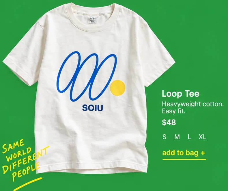 Soiu design close-up: cream Loop Tee with a cobalt loop print on green, beside its sizes and an add to bag link