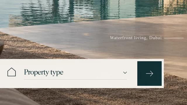 Close-up of the linen search bar's Property type field and square teal arrow under Waterfront living, Dubai
